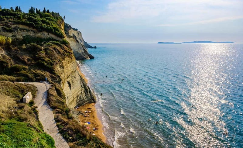 Corfu: Palaiokastritsa Swimming and Loggas Beach Sunset Tour - A sunset stop with one important detail to check