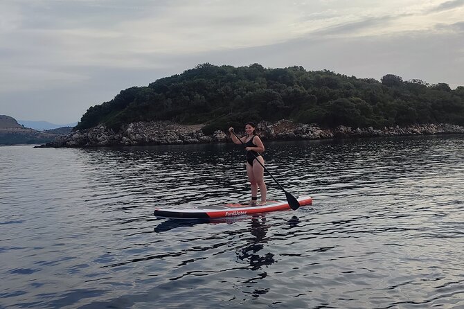 Stand Up Paddle-boarding around Ksamil islands (3 times a day) - Swimming, fish, and a drink afterward