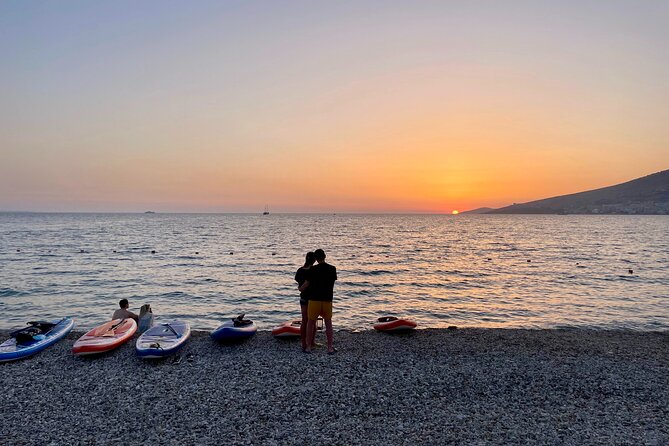 Sunset Saranda and Night City Glow Kayak or Sup Tour - Returning under Saranda’s city glow