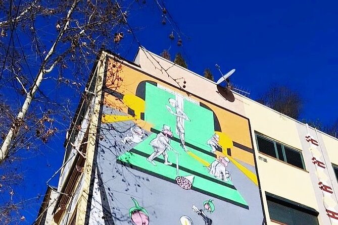 Tirana: Street Art & Modern Architecture Tour - Seeing Tirana through paint, signs, and new buildings