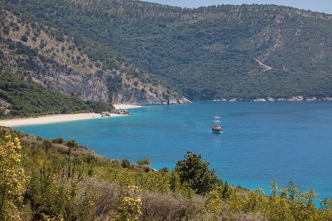 Visit Kroreza Beach by Boat - The approach to a beach behind rocky hills